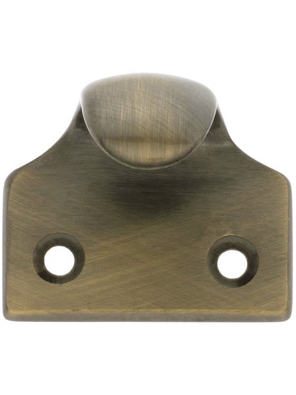 Heavy Duty Cast Brass Sash Lift in Antique Brass.